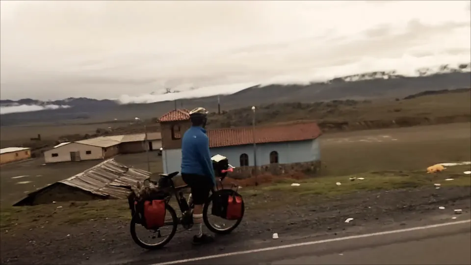 A loaded touring bike in a bleak mining village high in the Andes.